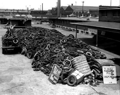 Tires stored in a messy heap with no storage rack
